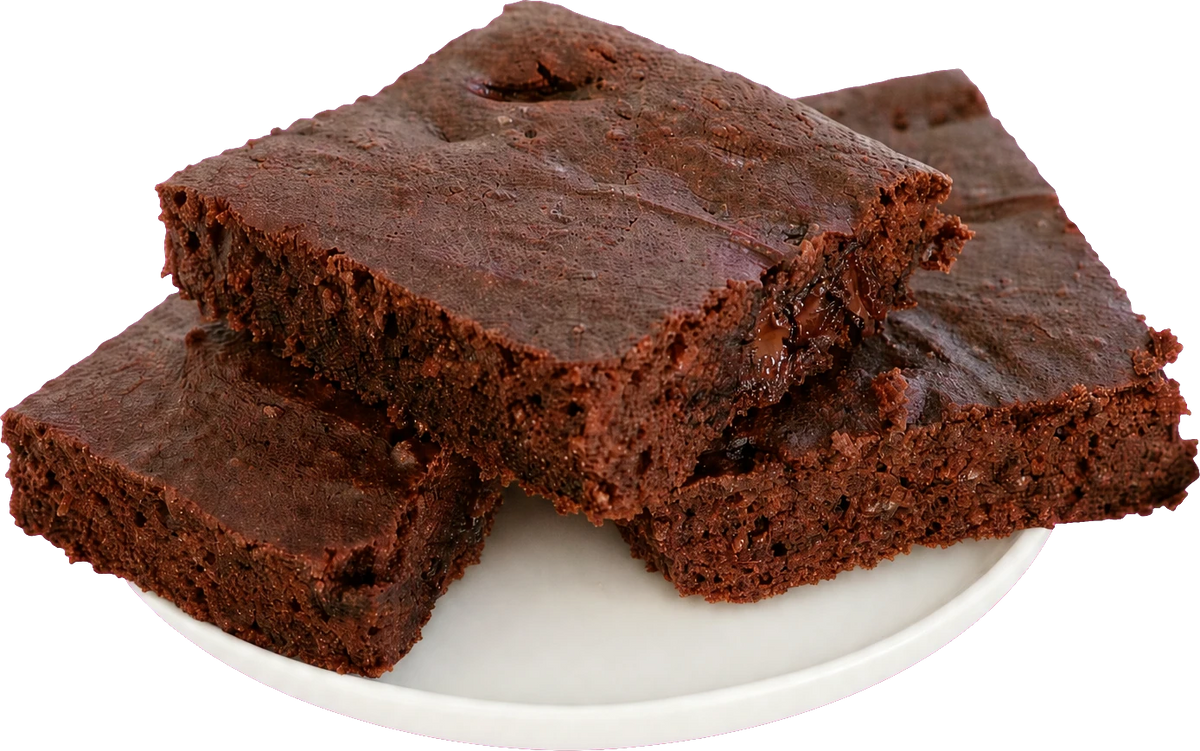 Three fudgy homemade protein brownies on a white plate